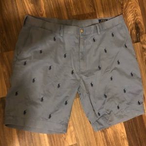 Men’s blue polo short with blue signature logo